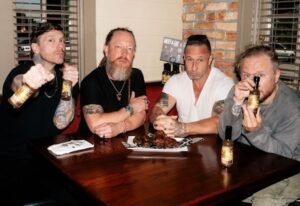 SHINEDOWN Teams Up With Smokey Bones To Carry Band's Hot Sauce