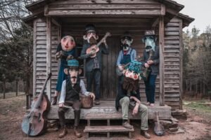 Shadows and Warnings: Del Roscoe’s “Black Hats” Delivers a Chilling Americana Tale