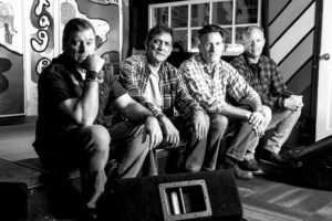 Roots Rock agitators Dave Hunter and the Seven Hundred bring a crooked gumbo to a boil on their debut album "Tamp That Fever Down"